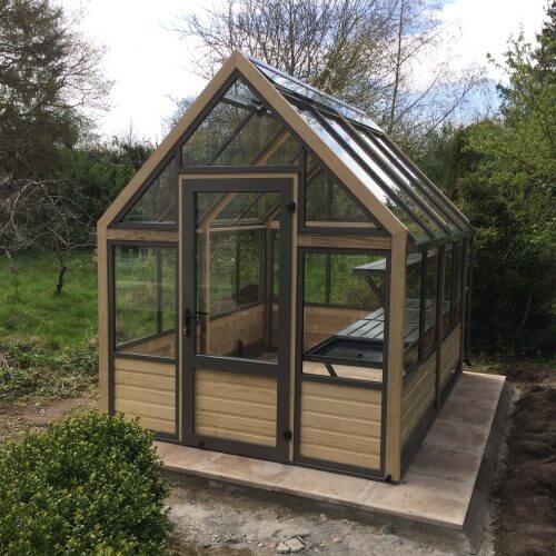 Example of Greenhouse with a well laid flagstone base - Cultivar